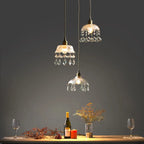 Three Maison Ornate Nordic Crystal Glass Chandeliers with intricate crystal details, elegantly illuminated.
