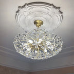 Maison Ornate Modern Retro Crystal Chandelier with gold base, crystal LED floral accents.