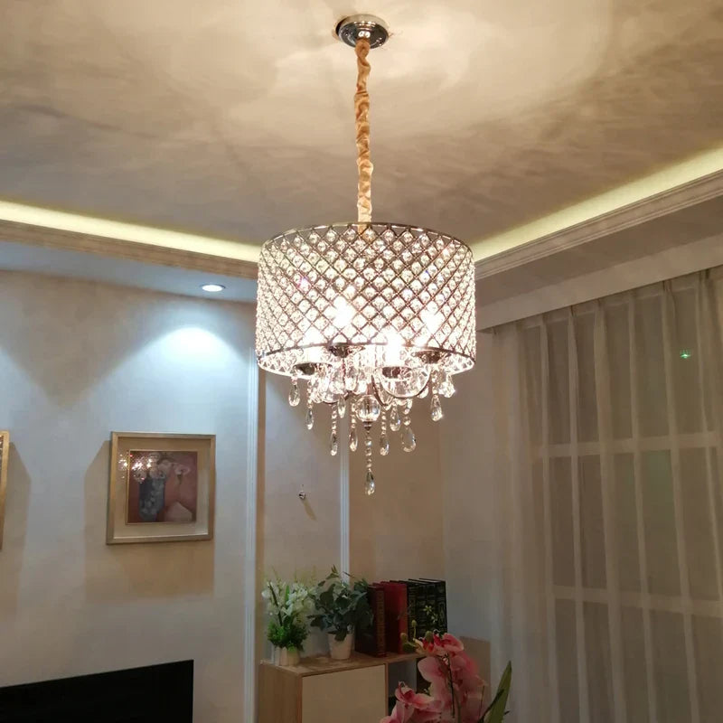 Maison Ornate Vintage Crystal Chandelier Iron features sparkling crystals and elegant ironwork in classic design.