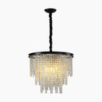 Ornate modern crystal chandelier with central light, crystal prisms, round gold-framed chain suspension.