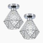 Modern chandelier with geometric diamond metal frames, circular crystal accents, and shiny chrome base.
