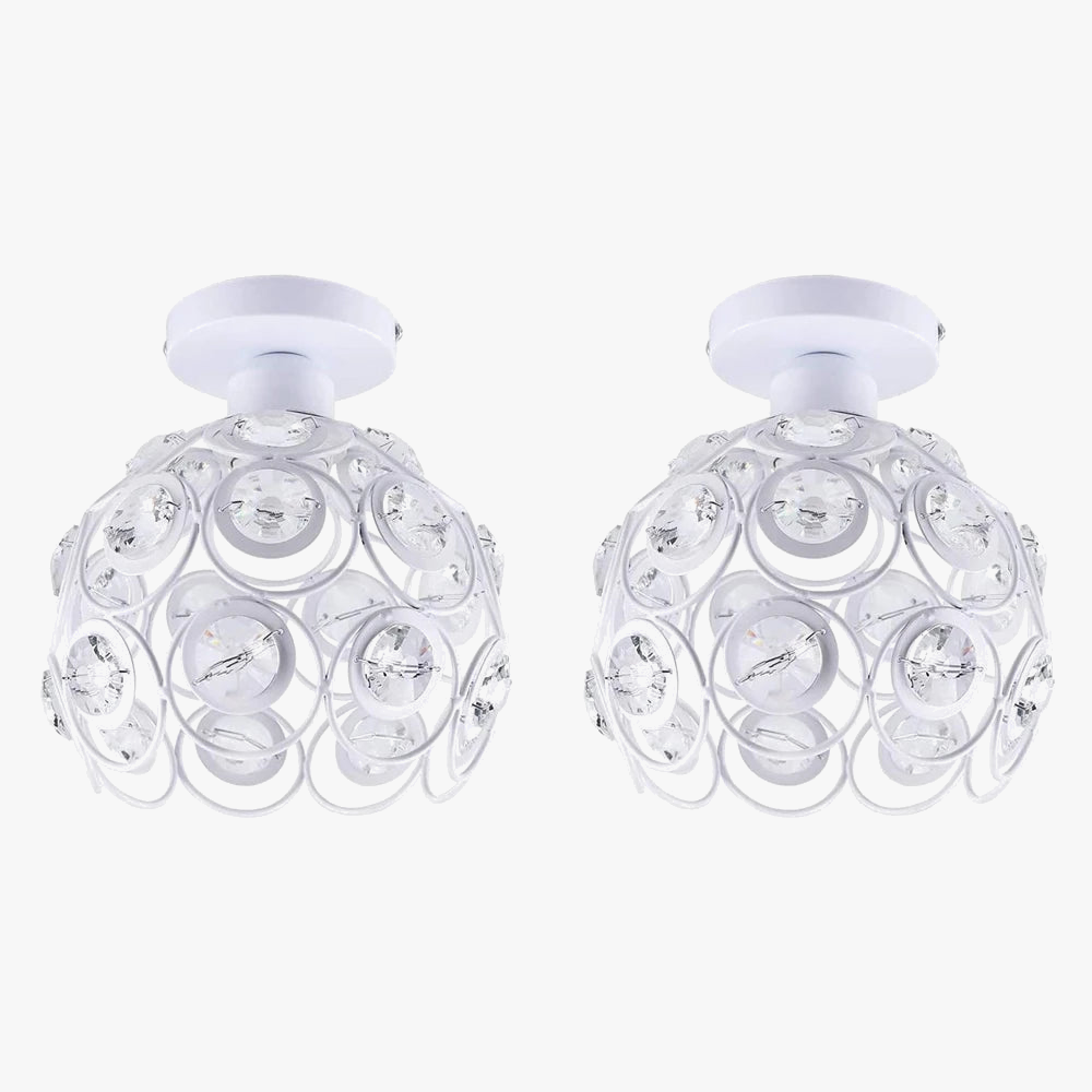 Ornate modern chandelier with spherical metal frames, clear crystals, and white round bases.
