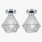 Pair of modern crystal hallway chandeliers with geometric metal frames and sparkling crystal accents.