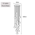 Line drawing of Maison Ornate Modern LED Crystal Icicle Chandelier with 12 varied-length pendants from a round base.