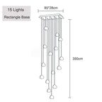Line drawing of Maison Ornate Modern LED Crystal Icicle chandelier, 15 lights, staggered cords, rectangular base.