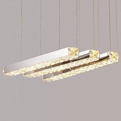 Modern crystal chandelier with glass tassels, three LED-lit bars suspended, textured glowing ends.