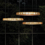 Three Maison Ornate Modern LED Crystal Ring Chandeliers, detailed with sparkling diamonds in concentric rings.