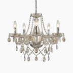 Maison Ornate Modern K9 Crystal 5-Light Chandelier with candle bulbs, crystal beads, teardrop accents, and chain suspension.