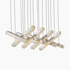 Luxury crystal chandelier with integrated LED lights, gleaming glass tassels, and elegant modern design.