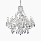 Maison Ornate Modern Crystal Chandelier with 12 candle lights, chrome acrylic finish, crystal accents.