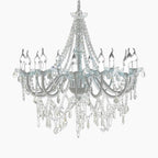 Ornate Venetian crystal chandelier with 12 candle lights, intricate metalwork, and sparkling glass prisms.