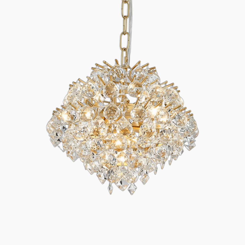 Gold chain-hung chandelier with faceted crystals, four bulbs, and a sparkling, elegant glow.