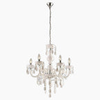 Maison Ornate 6-Arm Chandelier with curved arms, six candle bulbs, and crystal accents.