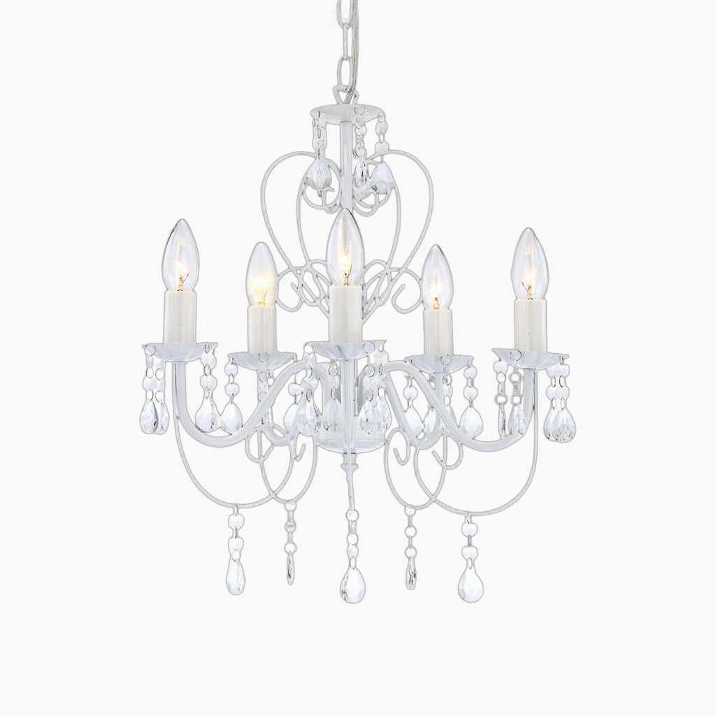 Classic white metal chandelier with five candle bulbs, curved arms, clear pendants, and chain suspension.