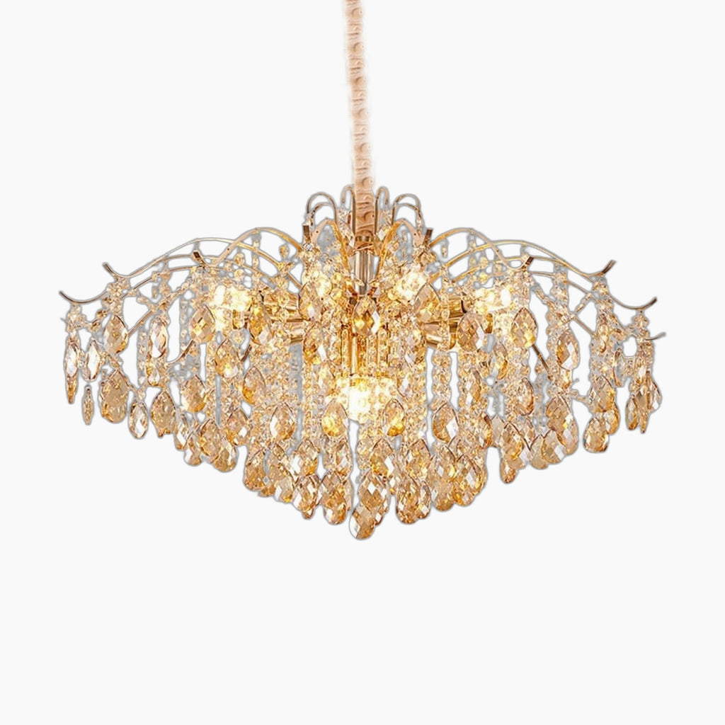 Elegant crystal bedroom chandelier with gold tassels and sparkling crystals, beautifully illuminated, product-only.