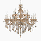 Gold-toned chandelier with maple leaf motif, twelve E14 candle lights, and crystal pendants.