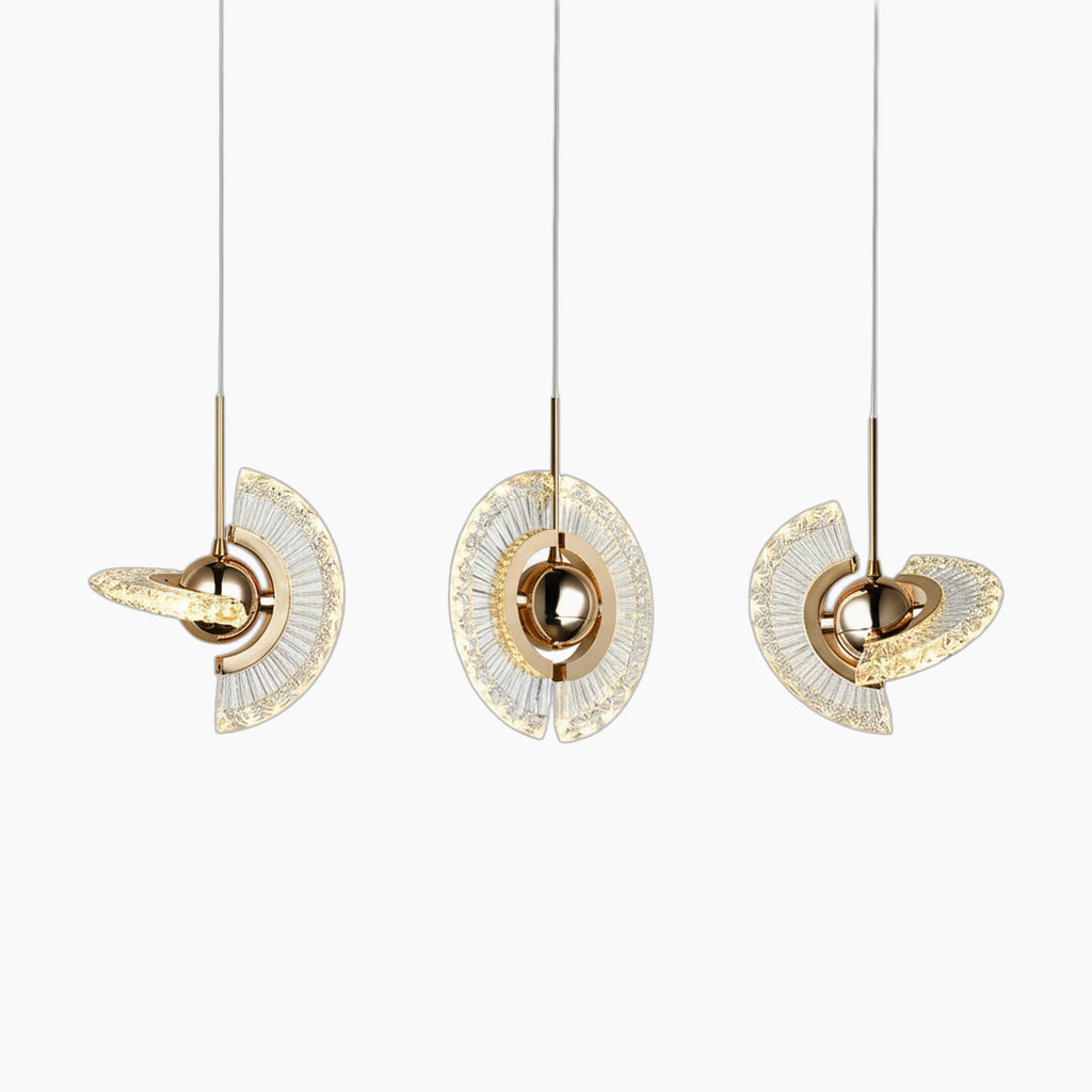 Modern crystal chandelier with gold accents, three angled textured glass pendants, LED compatible.