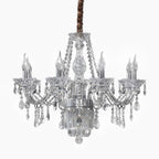 Elegant European chandelier with six candle bulbs, ornate glass arms, K9 crystal pendants, rope suspension.
