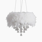 Maison Ornate Round LED Crystal Chandelier with feather tassels, clear crystal pendants, three-wire suspension.