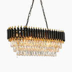 Three-tier crystal chandelier with iron frame, black and gold accents, K9 crystal droplets.