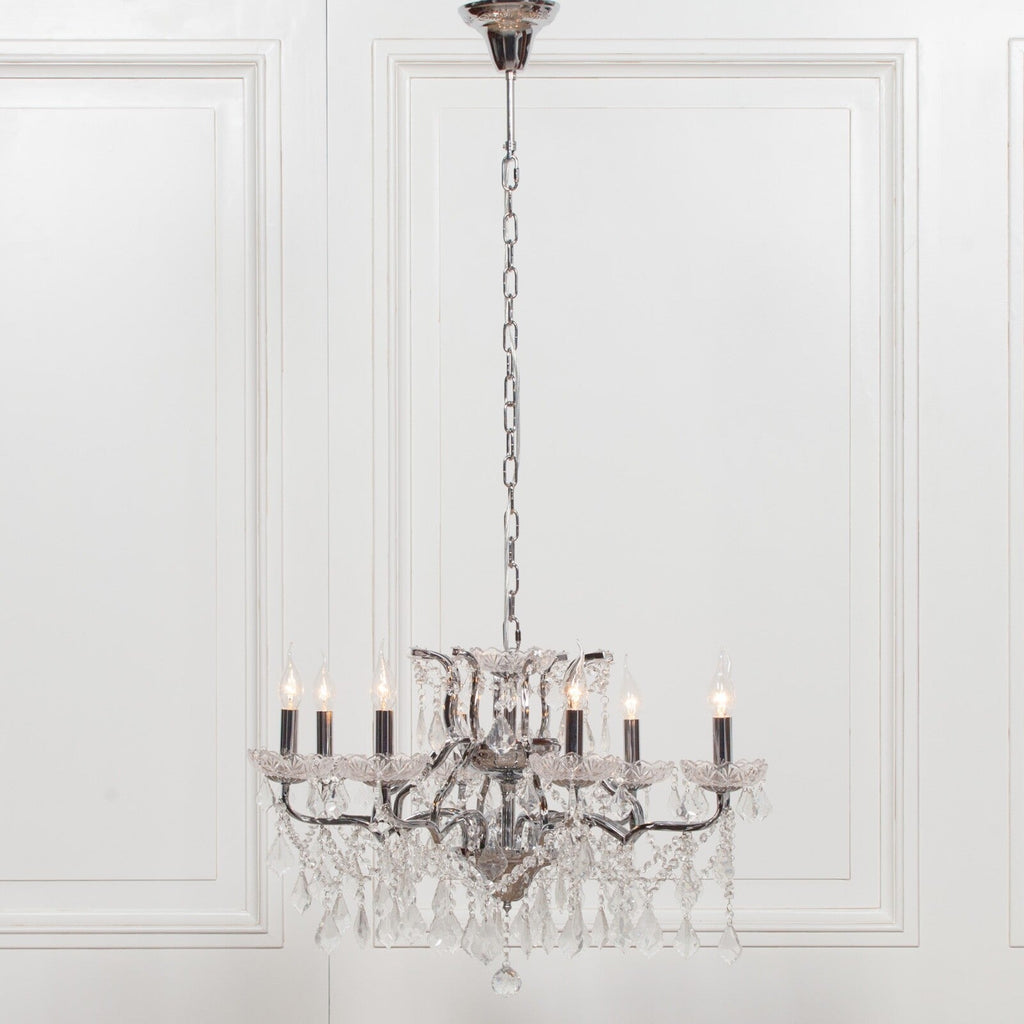 Maison Ornate French Style Crystal Chandelier with 8 chrome arms and sparkling crystal accents.
