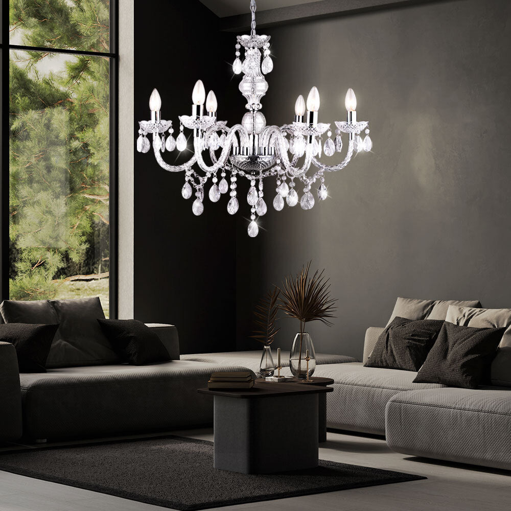 Maison Ornate Elegant Crystal Chandelier features silver tassels and chrome structure, suspended gracefully from the ceiling.