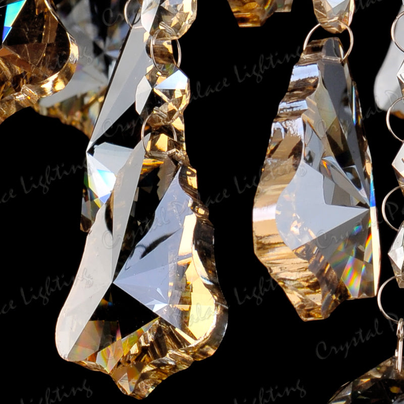 Maison Ornate K9 Crystal Champagne Chandelier with faceted crystals and gold accents reflecting light.