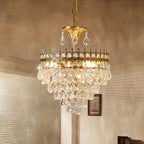 Maison Ornate chandelier with luxurious gold accents and radiant crystal drops, ceiling-mounted elegance.