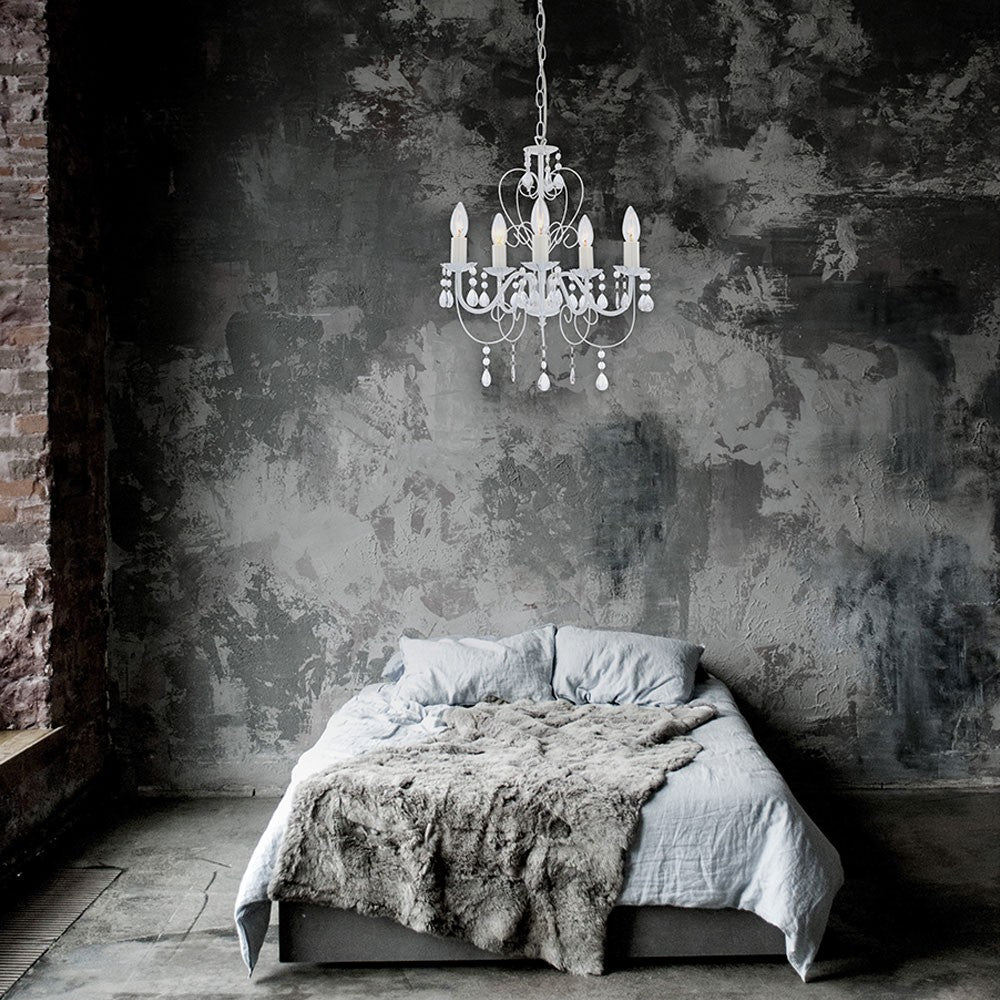 Maison Ornate Elegant Crystal Chandelier in classic white metal design, sparkling crystals, overhead lighting.