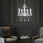 Maison Ornate Elegant Crystal Chandelier in white metal with classic design, softly glowing overhead.