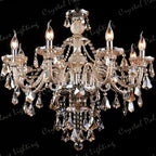 Maison Ornate chandelier with candle-style bulbs, K9 crystals, and a champagne finish, elegantly sparkling.
