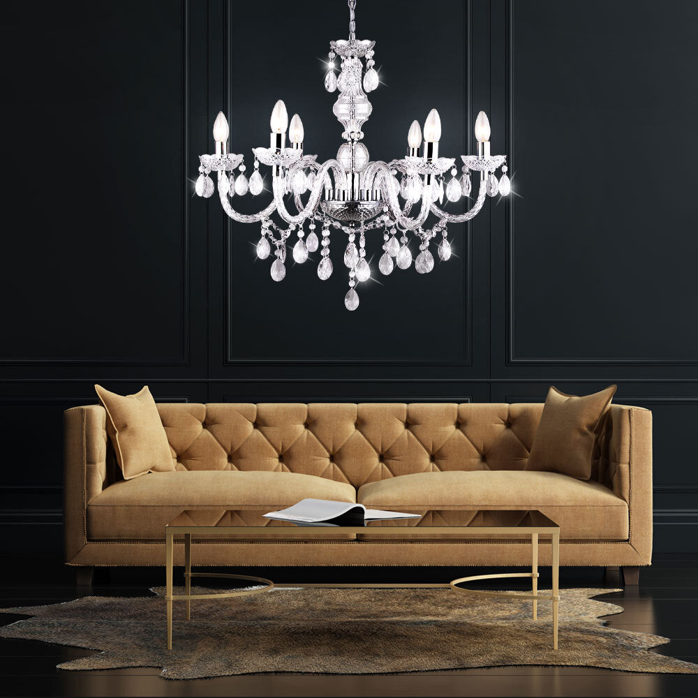 Maison Ornate Crystal Dining Room Chandelier with Reflective Tassels elegantly suspended, gold-finished accents shimmer.