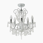 Maison Ornate Chrome Crystal Chandelier with five K5 glass arms, candle bulbs, and hanging crystals.