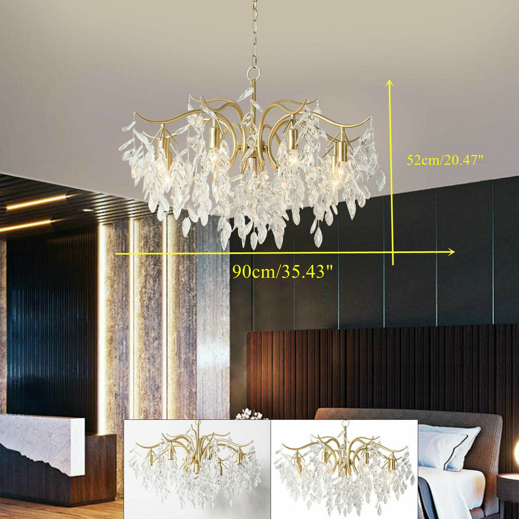 The Maison Ornate 8-arm gold crystal chandelier with detail insets, measuring 90cm by 52cm.