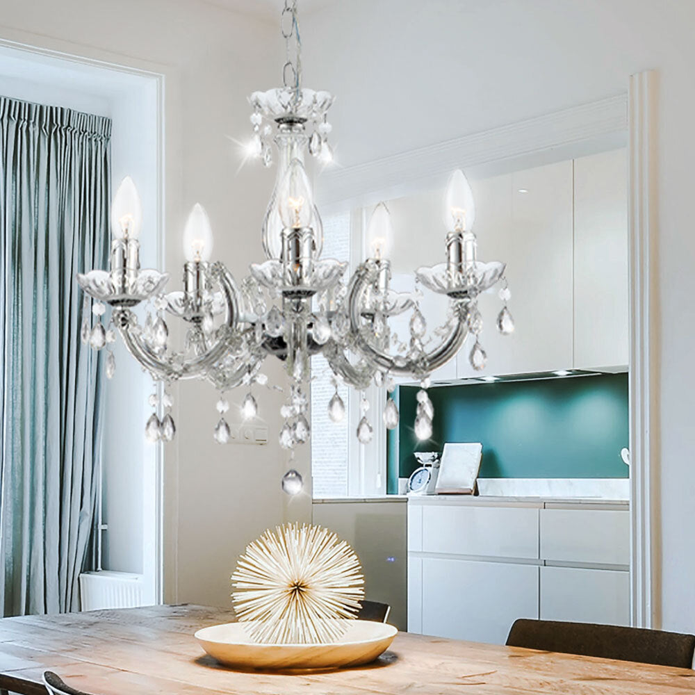 Maison Ornate Elegant Crystal Pendant Light in chrome with intricate crystal accents, modern chandelier design.