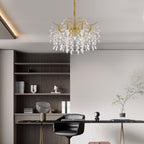 Maison Ornate Crystal Chandelier features a modern gold branch design with elegant hanging crystals.