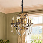Maison Ornate vintage bronze chandelier with six lights and crystal pendants, elegant hallway lighting.