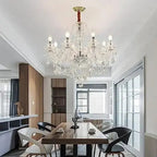 Maison Ornate Elegant 6-Arm Crystal Dining Room Chandelier with sparkling crystals and intricate metal detailing.
