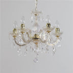 Maison Ornate Five-Arm Crystal Chandelier features candle bulbs, gold-toned arms, and sparkling crystal accents.