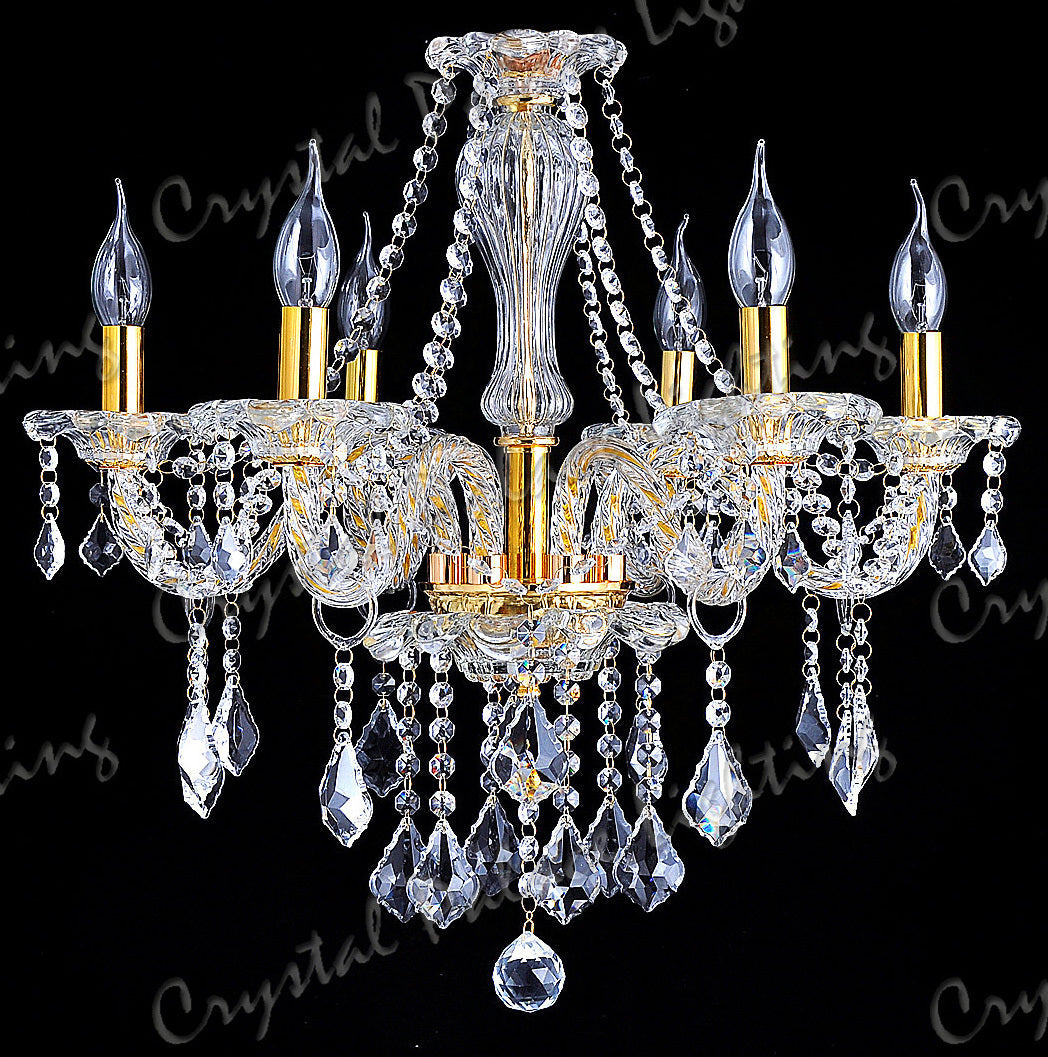 Ornate gold chandelier with maple leaf accents, six candle bulbs, twisted arms, and K9 crystal chains.
