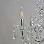 Maison Ornate Antique Crystal Chandelier with chrome arm, candle LED bulb, and crystal pendants.