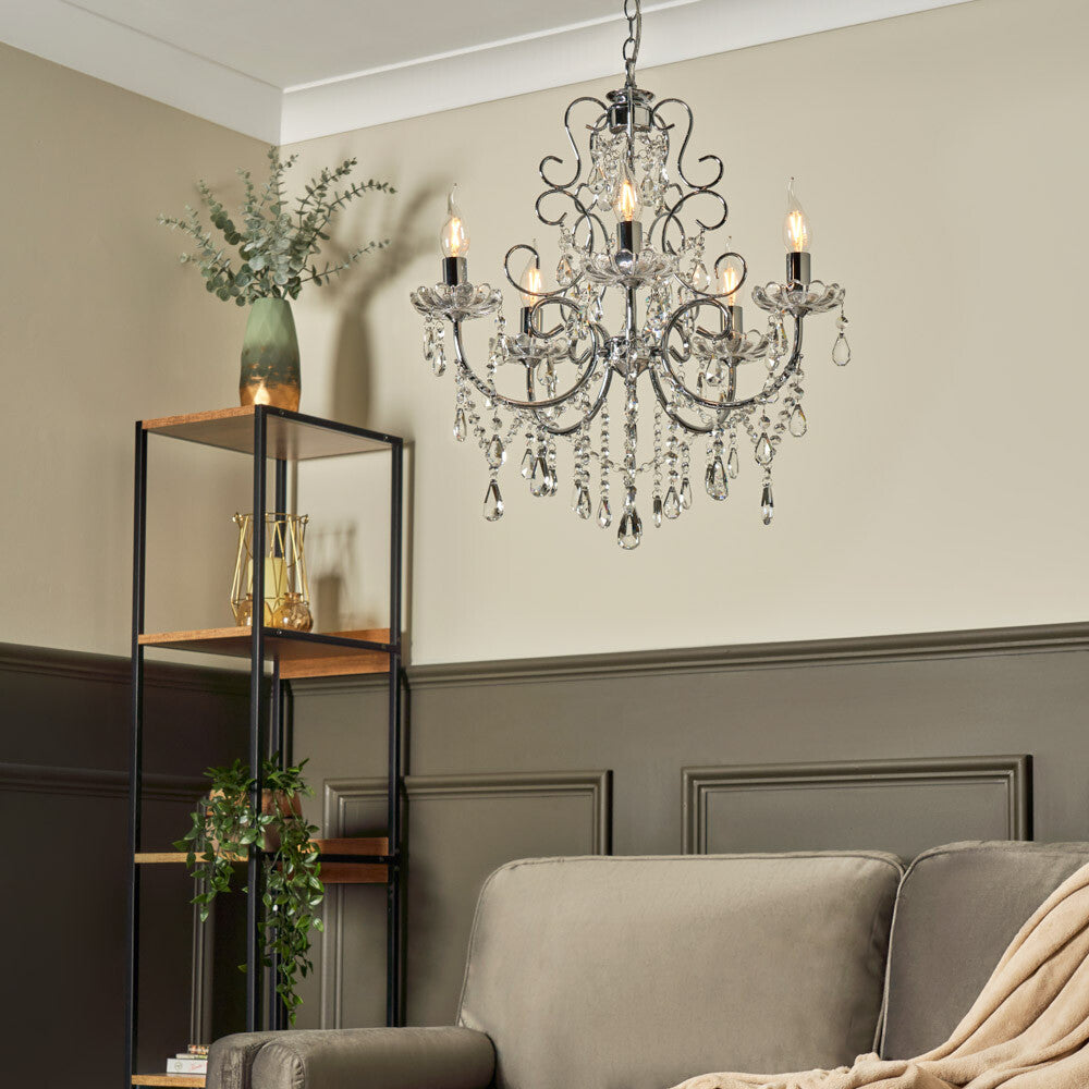 The Maison Ornate Antique Crystal Chandelier with Five Polished Chrome Arms, brilliant and elegant.