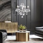 Elegant 5-branch Chrome Crystal Dining Room Chandelier by Maison Ornate hanging overhead, gleaming and decorative.