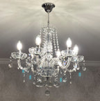 Maison Ornate Crystal Chandelier with chrome frame, five candle lights, glass arms, and K9 crystal accents.