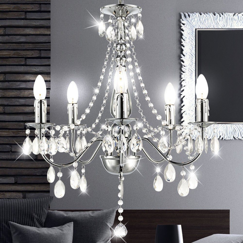 Maison Ornate Crystal Chandelier with chrome finish, sparkling accents, and five candle-style bulbs.