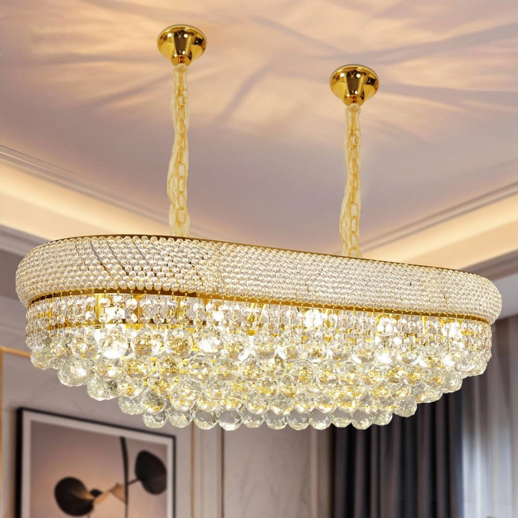 Empire style gold crystal chandelier with glass pendants, dual gold chains, and E14 bulb compatibility.