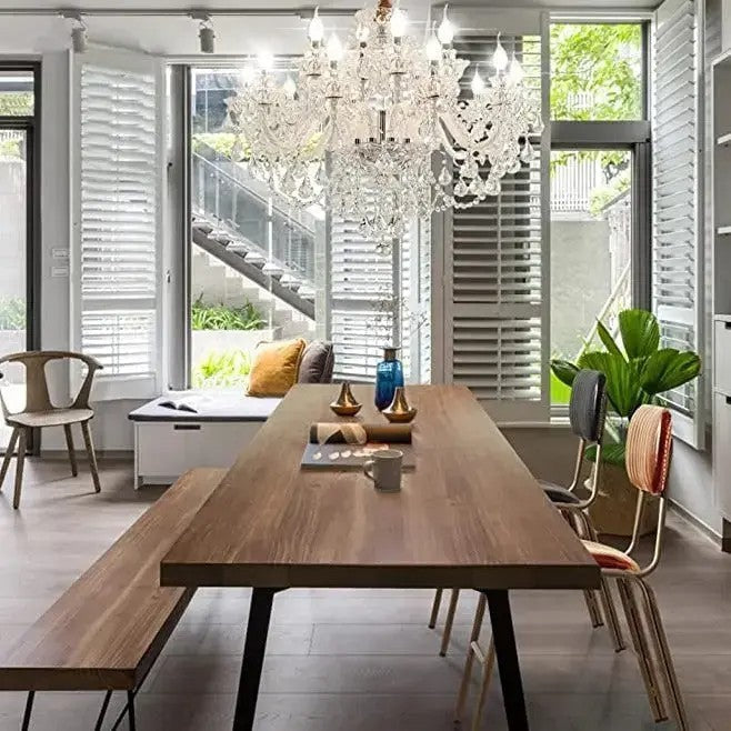 Elegant 6-Arm Crystal Dining Room Chandelier by Maison Ornate with sparkling crystal accents.