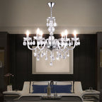 Maison Ornate Crystal Dining Room Chandelier featuring reflective tassels and intricate crystal detailing.