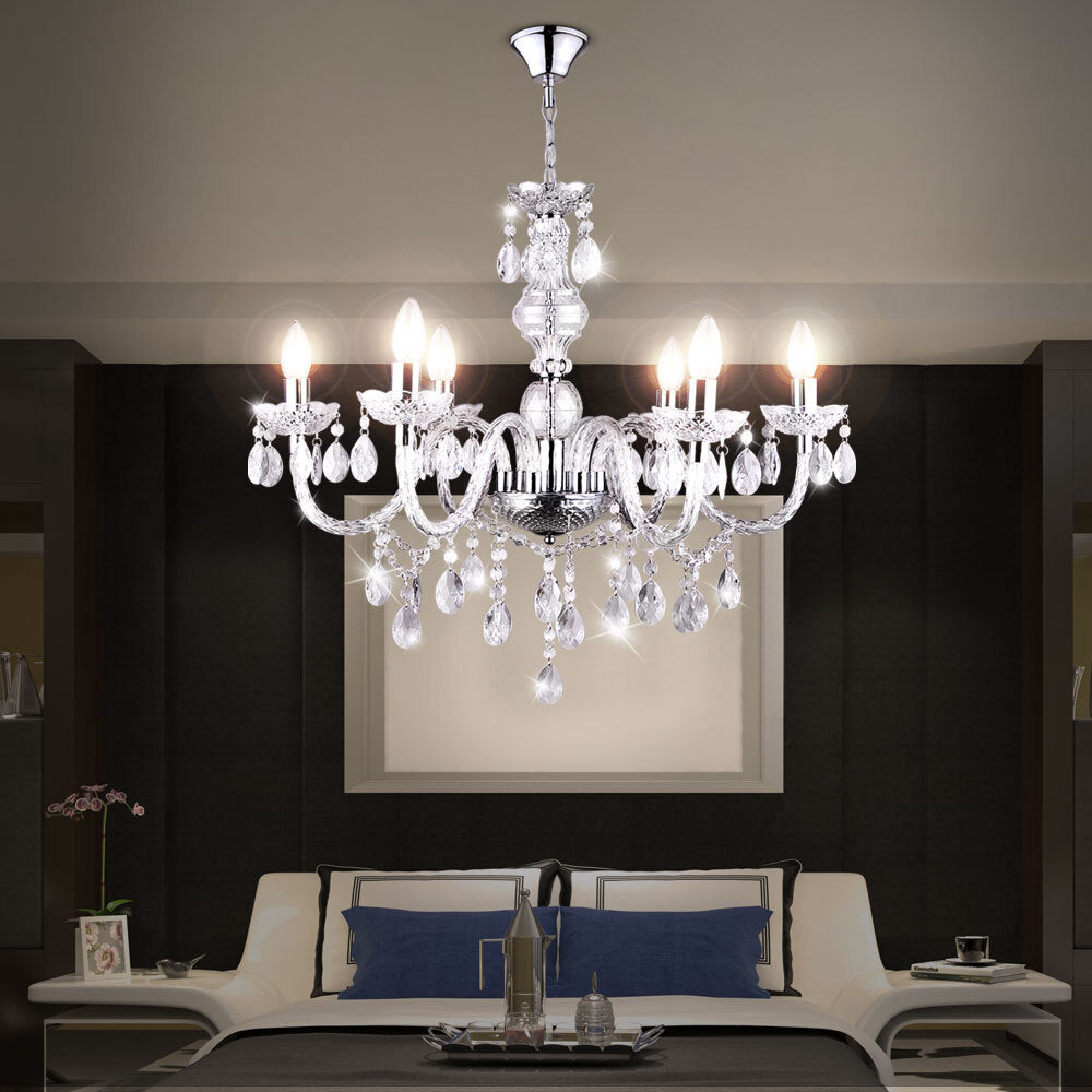 Maison Ornate Crystal Dining Room Chandelier featuring reflective tassels and intricate crystal detailing.