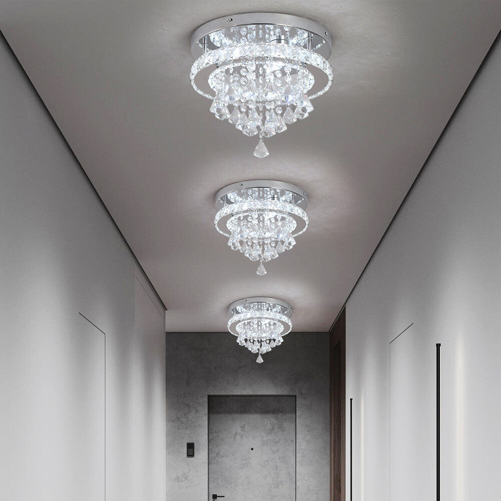 Three Maison Ornate Crystal Ball Chandeliers, ceiling-mounted with LED contemporary design, elegantly illuminate.